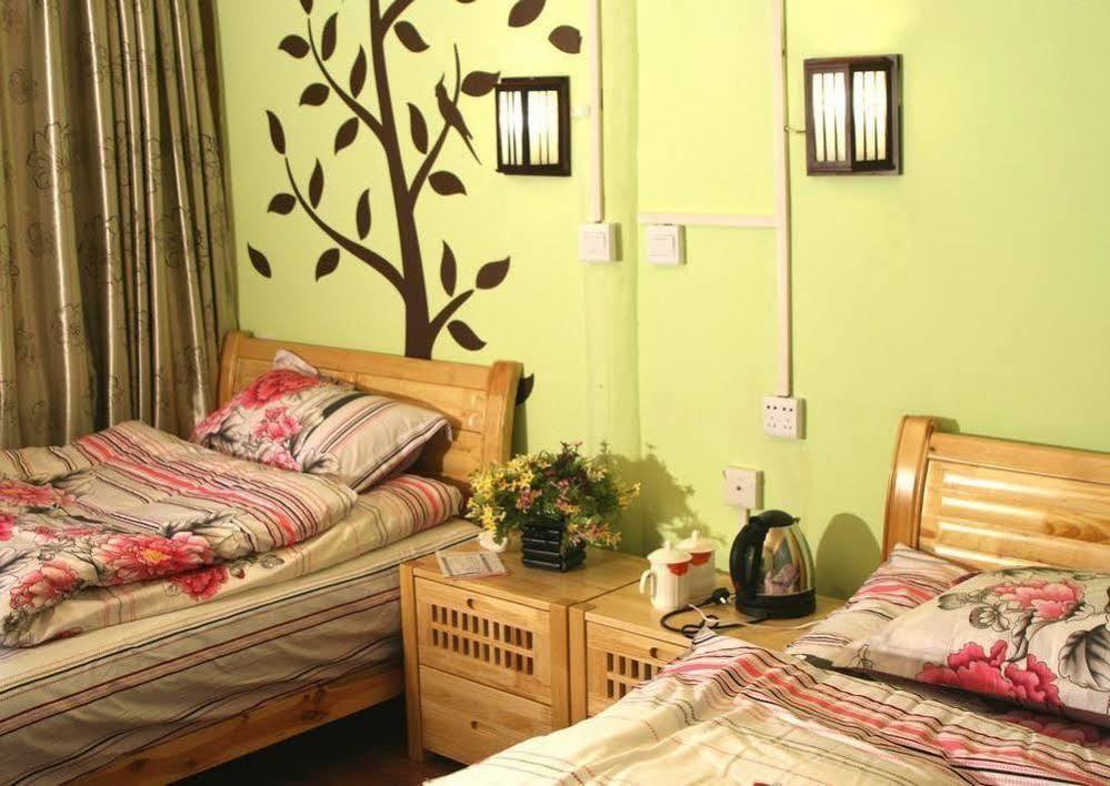 Tree'S Tale Hotel - Lijiang Lijiang  Esterno foto